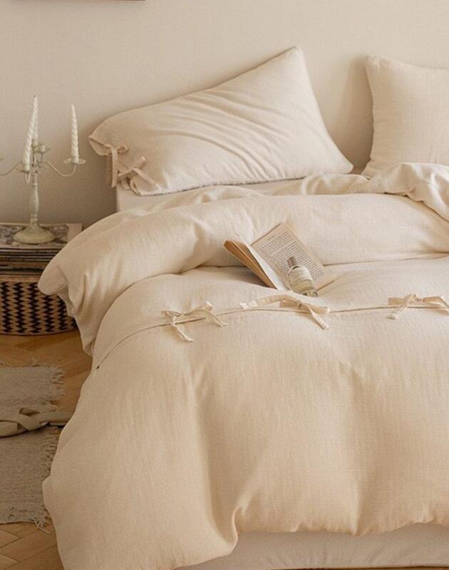 Set iz JYSK-a do danas na sniženju: Posteljina s mašnama kao najnježniji proljetni detalj